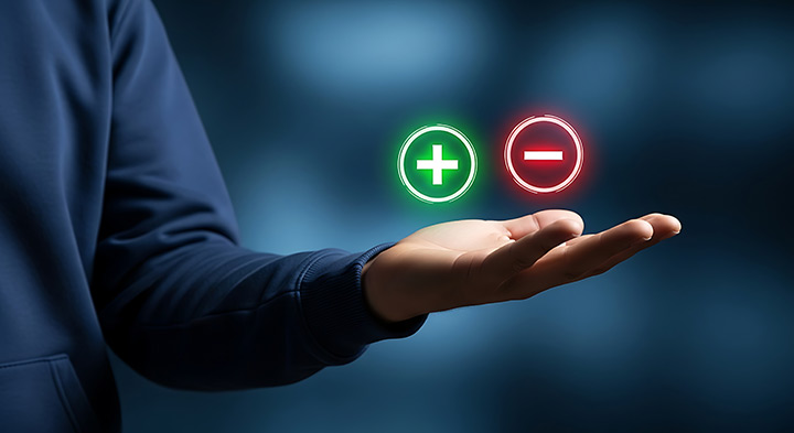 Person with outstretched hand and a plus and negative sign glowing above their hand.