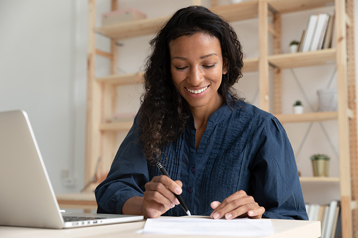 A grant writer works on a proposal.