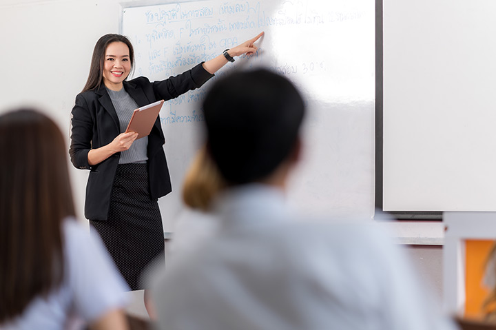The director of a social services organization discusses program policies with her team.