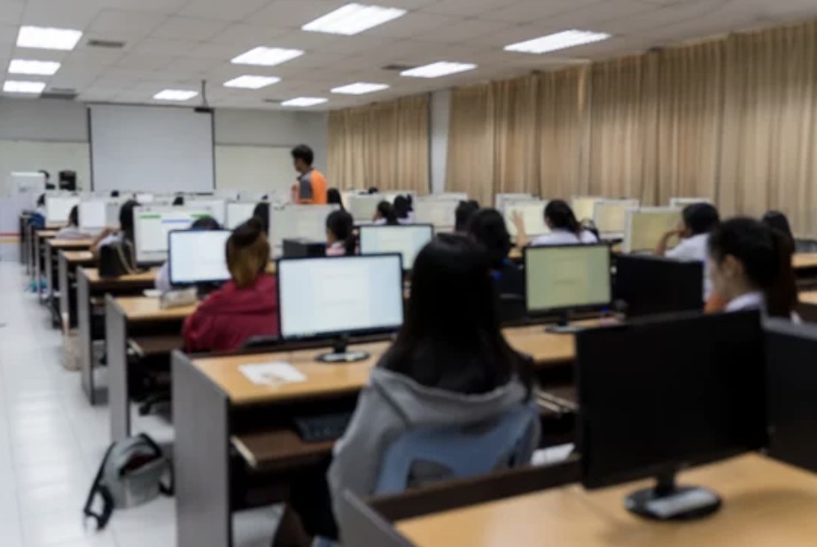 Social work licensure candidates taking the ASWB exam in a testing center.